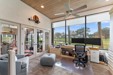 Enjoy golf and water views from this charming one-story on Delray Dunes Golf and Country Club in Florida - for sale on GolfHomes.com, golf home, golf lot