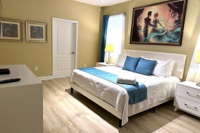 Turnkey, Fully Furnished 9-Bedroom Vacation Home with Future on The Oasis Club at Champions Gate in Florida - for sale on GolfHomes.com, golf home, golf lot