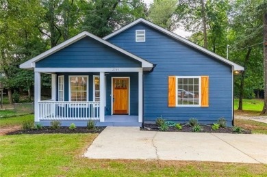 Step into modern elegance at this designer-renovated East Lake on East Lake Golf Club in Georgia - for sale on GolfHomes.com, golf home, golf lot