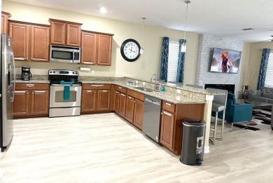 Turnkey, Fully Furnished 9-Bedroom Vacation Home with Future on The Oasis Club at Champions Gate in Florida - for sale on GolfHomes.com, golf home, golf lot
