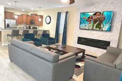 Turnkey, Fully Furnished 9-Bedroom Vacation Home with Future on The Oasis Club at Champions Gate in Florida - for sale on GolfHomes.com, golf home, golf lot