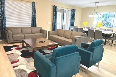 Turnkey, Fully Furnished 9-Bedroom Vacation Home with Future on The Oasis Club at Champions Gate in Florida - for sale on GolfHomes.com, golf home, golf lot