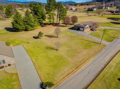 Absolute stunner on the Golf Course!!  This beautiful brick home on Clinchview Golf and Country Club in Tennessee - for sale on GolfHomes.com, golf home, golf lot