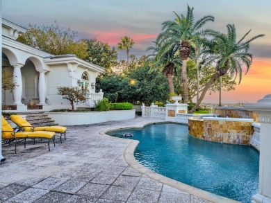 This stunning Waterfront Bay Estate is a rare gem nestled within on Kelly Plantation Golf Club in Florida - for sale on GolfHomes.com, golf home, golf lot