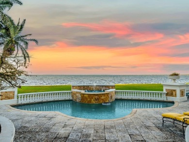 This stunning Waterfront Bay Estate is a rare gem nestled within on Kelly Plantation Golf Club in Florida - for sale on GolfHomes.com, golf home, golf lot