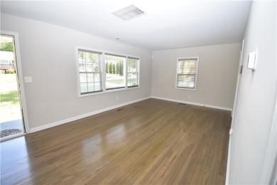 This beautiful brick bungalow style home has been recently on Browns Mill Golf Course in Georgia - for sale on GolfHomes.com, golf home, golf lot