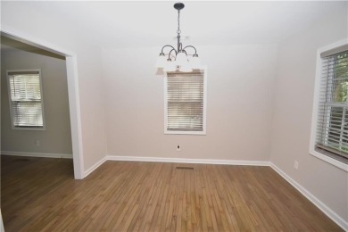 This beautiful brick bungalow style home has been recently on Browns Mill Golf Course in Georgia - for sale on GolfHomes.com, golf home, golf lot