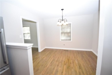 This beautiful brick bungalow style home has been recently on Browns Mill Golf Course in Georgia - for sale on GolfHomes.com, golf home, golf lot