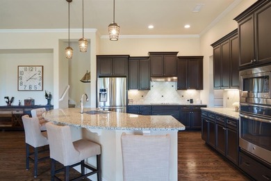 Welcome to 9709 Stonewood Drive in the highly sought-after 55+ on Wildhorse Golf Club of Robson Ranch in Texas - for sale on GolfHomes.com, golf home, golf lot