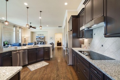 Welcome to 9709 Stonewood Drive in the highly sought-after 55+ on Wildhorse Golf Club of Robson Ranch in Texas - for sale on GolfHomes.com, golf home, golf lot