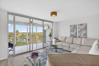 RARE 3 BR/ 2BA CORNER CONDO ON LAKE TUCKED IN WONDERFUL ACTIVE on Palm-Aire Country Club and Resort - The Oaks in Florida - for sale on GolfHomes.com, golf home, golf lot