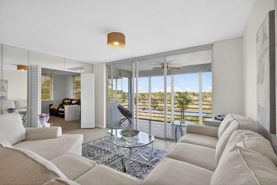 RARE 3 BR/ 2BA CORNER CONDO ON LAKE TUCKED IN WONDERFUL ACTIVE on Palm-Aire Country Club and Resort - The Oaks in Florida - for sale on GolfHomes.com, golf home, golf lot