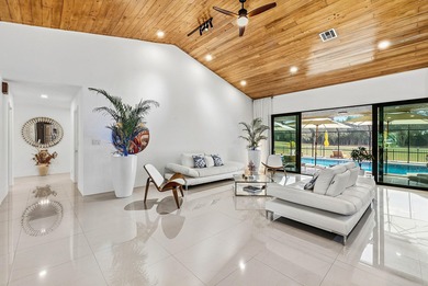 Completely high end renovated, this 3,151 sft home is located in on Boca Woods Country Club in Florida - for sale on GolfHomes.com, golf home, golf lot