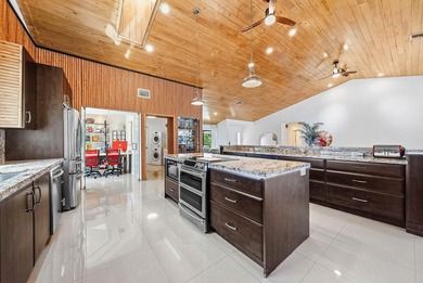 Completely high end renovated, this 3,151 sft home is located in on Boca Woods Country Club in Florida - for sale on GolfHomes.com, golf home, golf lot