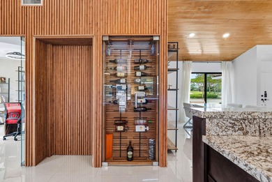 Completely high end renovated, this 3,151 sft home is located in on Boca Woods Country Club in Florida - for sale on GolfHomes.com, golf home, golf lot