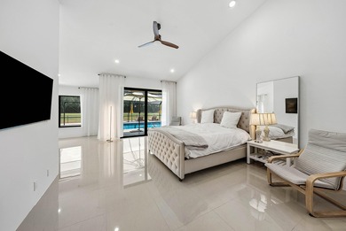 Completely high end renovated, this 3,151 sft home is located in on Boca Woods Country Club in Florida - for sale on GolfHomes.com, golf home, golf lot