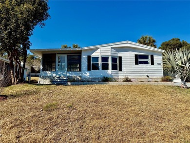 Move-in ready and full of charm, this 2-bedroom, 2-bath home is on Zellwood Station Country Club in Florida - for sale on GolfHomes.com, golf home, golf lot