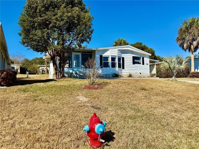 Move-in ready and full of charm, this 2-bedroom, 2-bath home is on Zellwood Station Country Club in Florida - for sale on GolfHomes.com, golf home, golf lot