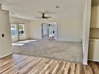 Move-in ready and beautifully refreshed, this 2-bedroom, 2-bath on Zellwood Station Country Club in Florida - for sale on GolfHomes.com, golf home, golf lot