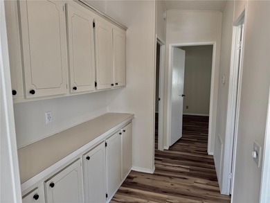 Move-in ready and beautifully refreshed, this 2-bedroom, 2-bath on Zellwood Station Country Club in Florida - for sale on GolfHomes.com, golf home, golf lot