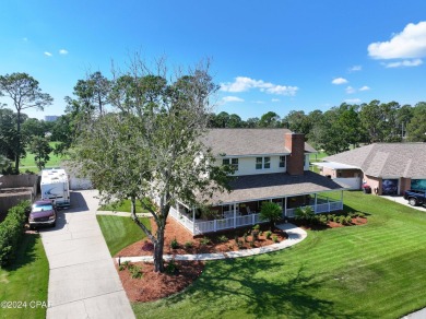 Wow! It is a custom built, one owner brick home on a large lot on Holiday Golf Club in Florida - for sale on GolfHomes.com, golf home, golf lot