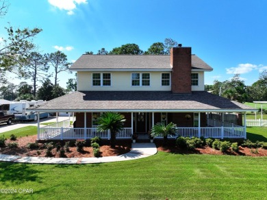 Wow! It is a custom built, one owner brick home on a large lot on Holiday Golf Club in Florida - for sale on GolfHomes.com, golf home, golf lot