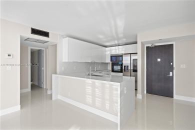 Discover your dream home in this fully upgraded 15th-floor on Turnberry Isle Resort and Club in Florida - for sale on GolfHomes.com, golf home, golf lot