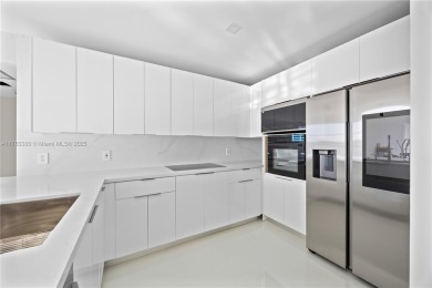 Discover your dream home in this fully upgraded 15th-floor on Turnberry Isle Resort and Club in Florida - for sale on GolfHomes.com, golf home, golf lot