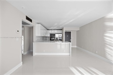 Discover your dream home in this fully upgraded 15th-floor on Turnberry Isle Resort and Club in Florida - for sale on GolfHomes.com, golf home, golf lot