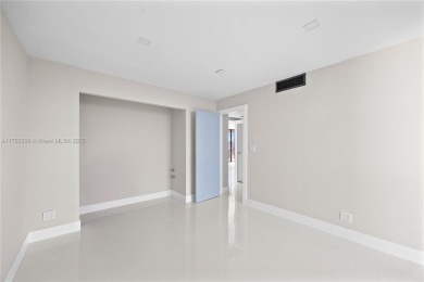 Discover your dream home in this fully upgraded 15th-floor on Turnberry Isle Resort and Club in Florida - for sale on GolfHomes.com, golf home, golf lot