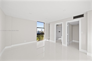 Discover your dream home in this fully upgraded 15th-floor on Turnberry Isle Resort and Club in Florida - for sale on GolfHomes.com, golf home, golf lot