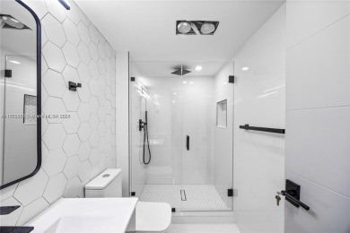 Discover your dream home in this fully upgraded 15th-floor on Turnberry Isle Resort and Club in Florida - for sale on GolfHomes.com, golf home, golf lot