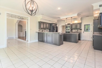 Situated Perfectly on a pristine home site on Memphis National on Memphis National Golf Club in Tennessee - for sale on GolfHomes.com, golf home, golf lot