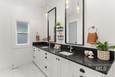 Custom-built waterfront home in the coveted Legacy community! on Eagle Legacy Golf Course in Idaho - for sale on GolfHomes.com, golf home, golf lot