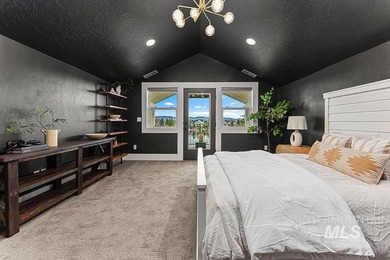 Custom-built waterfront home in the coveted Legacy community! on Eagle Legacy Golf Course in Idaho - for sale on GolfHomes.com, golf home, golf lot