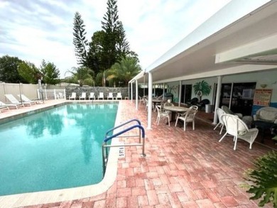 Welcome to this immaculately kept 3-bedroom, 2-bathroom home on Golf Hammock Country Club in Florida - for sale on GolfHomes.com, golf home, golf lot