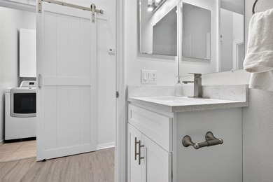 One or more photo(s) has been virtually stagedpletely Remodeled on Sanctuary Ridge Golf in Florida - for sale on GolfHomes.com, golf home, golf lot