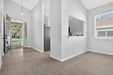 One or more photo(s) has been virtually stagedpletely Remodeled on Sanctuary Ridge Golf in Florida - for sale on GolfHomes.com, golf home, golf lot