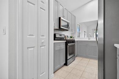 One or more photo(s) has been virtually stagedpletely Remodeled on Sanctuary Ridge Golf in Florida - for sale on GolfHomes.com, golf home, golf lot