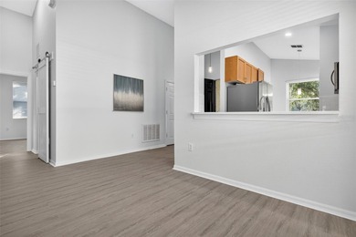 One or more photo(s) has been virtually stagedpletely Remodeled on Sanctuary Ridge Golf in Florida - for sale on GolfHomes.com, golf home, golf lot