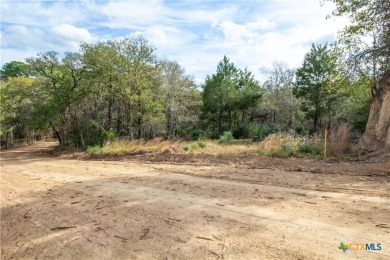 Tahitian Village, located in Bastrop, TX, is a peaceful on Pine Forest Golf Club in Texas - for sale on GolfHomes.com, golf home, golf lot