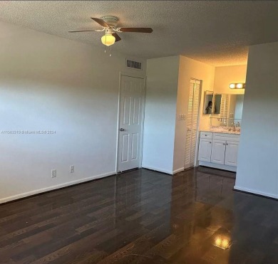 Welcome to your serene sanctuary in the gated community of on Inverrary Country Club in Florida - for sale on GolfHomes.com, golf home, golf lot