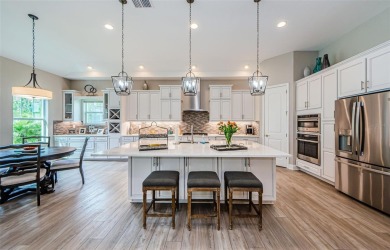 Stunning Biscayne Model in the Gated Woodlands at Longleaf on Seven Springs Golf and Country Club in Florida - for sale on GolfHomes.com, golf home, golf lot