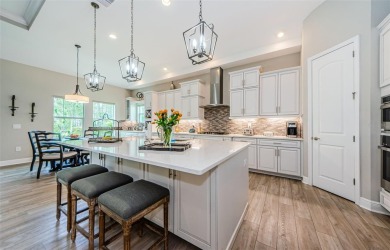 Stunning Biscayne Model in the Gated Woodlands at Longleaf on Seven Springs Golf and Country Club in Florida - for sale on GolfHomes.com, golf home, golf lot