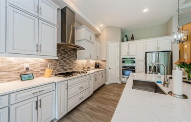 Stunning Biscayne Model in the Gated Woodlands at Longleaf on Seven Springs Golf and Country Club in Florida - for sale on GolfHomes.com, golf home, golf lot
