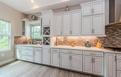 Stunning Biscayne Model in the Gated Woodlands at Longleaf on Seven Springs Golf and Country Club in Florida - for sale on GolfHomes.com, golf home, golf lot