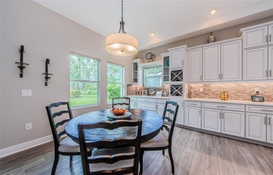 Stunning Biscayne Model in the Gated Woodlands at Longleaf on Seven Springs Golf and Country Club in Florida - for sale on GolfHomes.com, golf home, golf lot