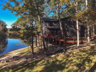 This stunning, fully furnished 4 bed and 2 bath lakefront chalet on Innsbrook Resort Golf Course in Missouri - for sale on GolfHomes.com, golf home, golf lot