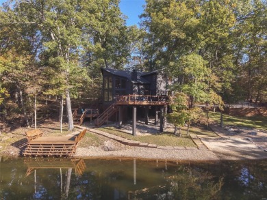 This stunning, fully furnished 4 bed and 2 bath lakefront chalet on Innsbrook Resort Golf Course in Missouri - for sale on GolfHomes.com, golf home, golf lot