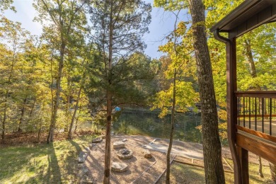 This stunning, fully furnished 4 bed and 2 bath lakefront chalet on Innsbrook Resort Golf Course in Missouri - for sale on GolfHomes.com, golf home, golf lot